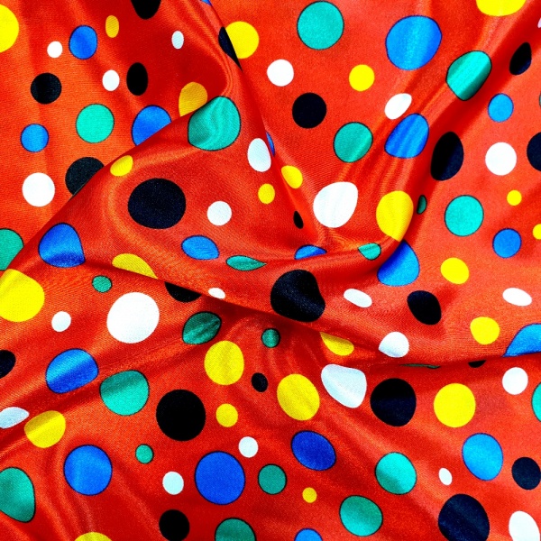 Multi Coloured Polkadots on Red Satin